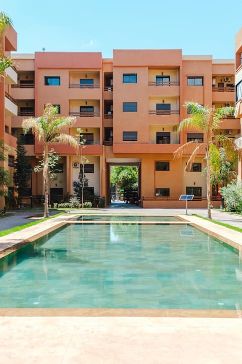 Property building, Day, Pool view, Swimming pool, sunbed