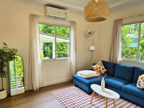 Living room, Seating area, Garden view, internet, air conditioner
