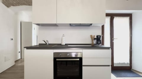 Kitchen or kitchenette, oven, stove