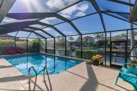 Patio, Natural landscape, Pool view, Swimming pool, sunbed