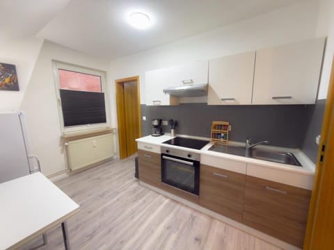 Kitchen or kitchenette, stove, kitchen