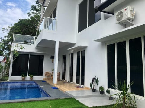Property building, Day, View (from property/room), Pool view, Swimming pool, sunbed