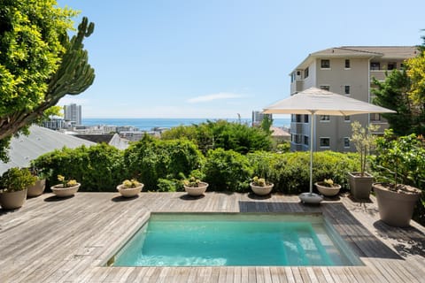 Property building, Patio, Natural landscape, Bird's eye view, Garden, View (from property/room), Guests, Guests, Garden view, Mountain view, Mountain view, Pool view, Pool view, Sea view, Swimming pool, group of guests, group of guests, sunbed