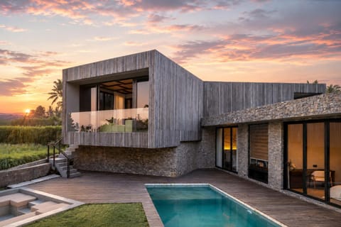 Property building, Patio, Natural landscape, Pool view, Swimming pool, Sunset, sunbed
