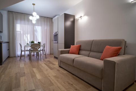 Kitchen or kitchenette, Living room, Seating area, Dining area