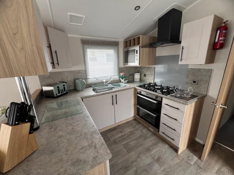 Kitchen or kitchenette, oven, stove, toaster