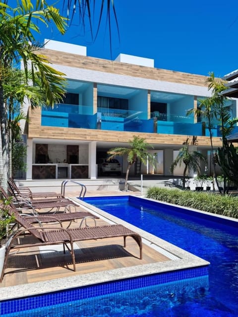 Property building, BBQ facilities, Dining area, Swimming pool, Parking, sunbed