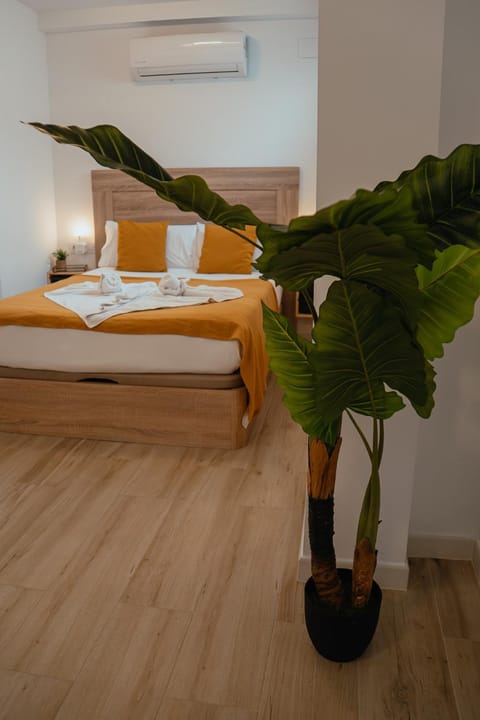 Bed, Photo of the whole room, Bedroom, towels, air conditioner