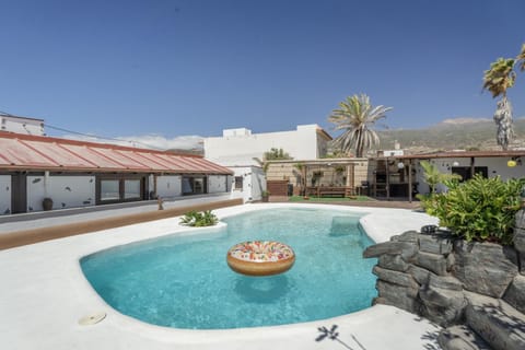 Property building, Living room, Swimming pool