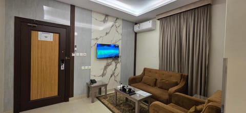 Communal lounge/ TV room, Seating area, air conditioner