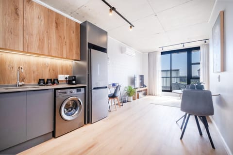 Kitchen or kitchenette, Dining area, washing machine, air conditioner