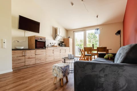 Kitchen or kitchenette, Living room, Seating area, Dining area