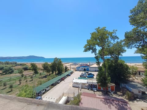 Property building, Nearby landmark, Day, Neighbourhood, Natural landscape, Beach, Sea view