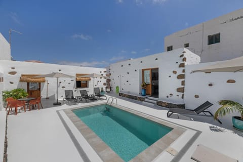 Property building, Living room, Swimming pool