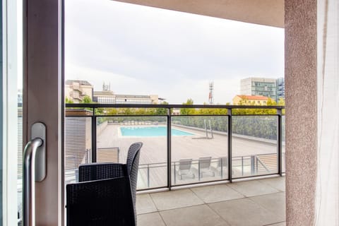 View (from property/room), Balcony/Terrace, Pool view, Swimming pool