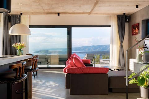 View (from property/room), Living room, Seating area, Mountain view, Sea view