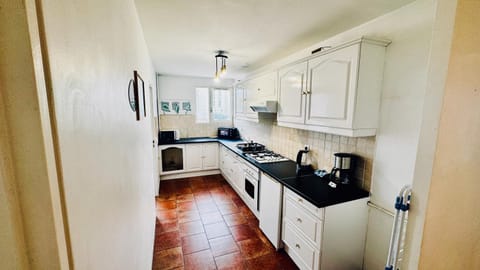 Kitchen or kitchenette, oven, stove