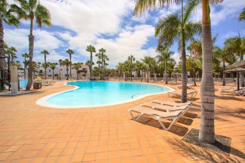 Property building, Living room, Swimming pool