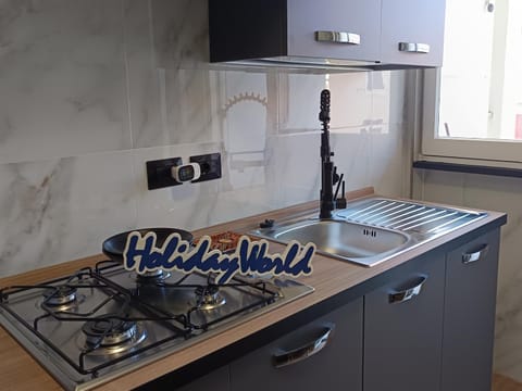 Kitchen or kitchenette, stove