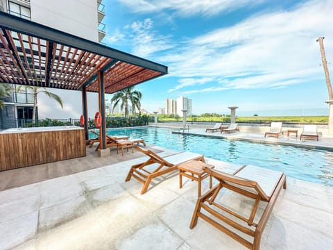 Property building, Day, Natural landscape, View (from property/room), Swimming pool, sunbed