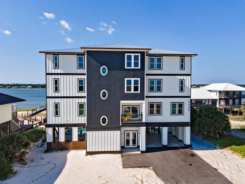 Black Tie Escape 8 bedrooms Waterfront Private Pool & Pier Sleeps 28 by Prickett Properties House in West Beach