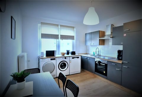 Kitchen or kitchenette, Dining area, dishwasher, oven, pet friendly, stove, toaster, washing machine, dryer