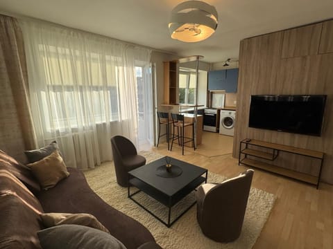 Communal lounge/ TV room, Kitchen or kitchenette, Living room, Seating area, Dining area
