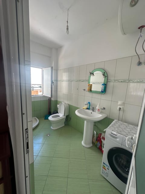 Toilet, Bathroom, towels, washing machine