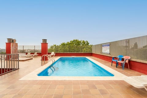 Property building, Living room, Swimming pool