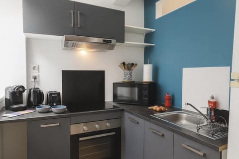 Kitchen or kitchenette, oven, stove, toaster