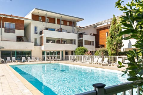Property building, Living room, Swimming pool