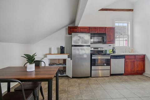 Kitchen or kitchenette, dishwasher, oven, stove, toaster