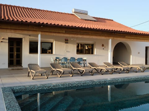 Property building, Pool view, Swimming pool, sunbed