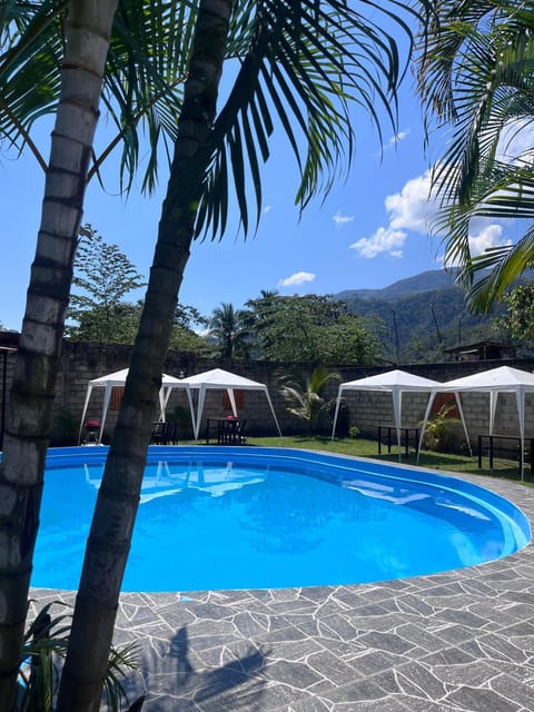 Day, Natural landscape, Garden, Garden view, Mountain view, Swimming pool