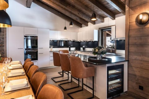 Kitchen or kitchenette, dishwasher, oven, stove