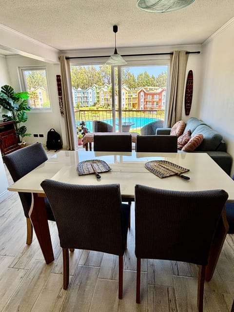 View (from property/room), Balcony/Terrace, Living room, Dining area, Pool view, Swimming pool