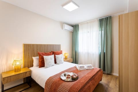 Bed, Bedroom, towels, wardrobe, air conditioner