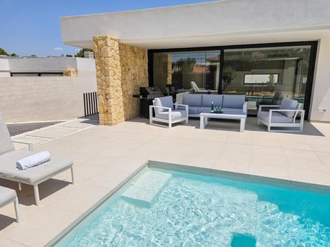 Property building, View (from property/room), Pool view, Swimming pool, sunbed
