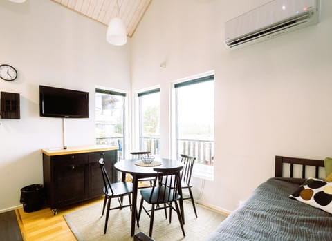 Communal lounge/ TV room, Bed, Living room, Dining area, fireplace, air conditioner