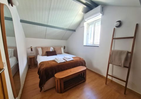 Bed, Photo of the whole room, Bedroom, towels, air conditioner
