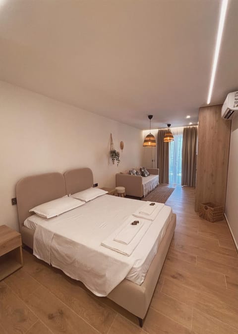 Bed, Living room, Photo of the whole room, Seating area, Bedroom, towels, wardrobe