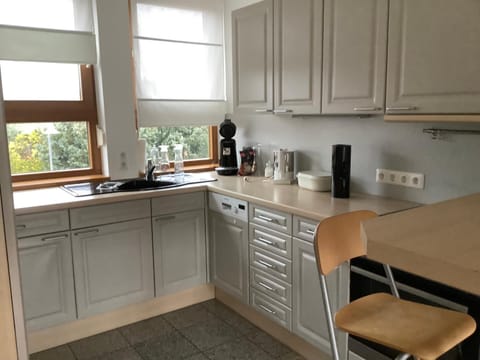 Kitchen or kitchenette, Dining area, dishwasher, stove, toaster