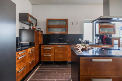 Kitchen or kitchenette, dishwasher, oven, stove