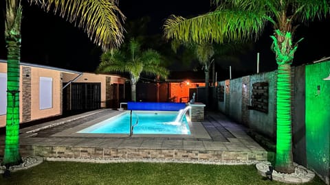 Property building, Patio, Off site, Night, Garden, On site, Garden view, Pool view, Swimming pool