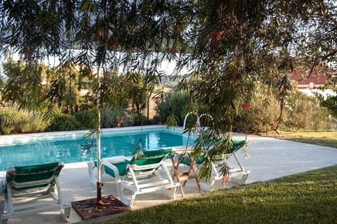 Property building, Living room, Swimming pool