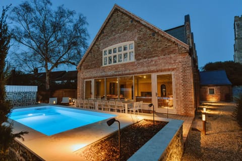 Property building, Patio, Night, Pool view, Swimming pool, sunbed