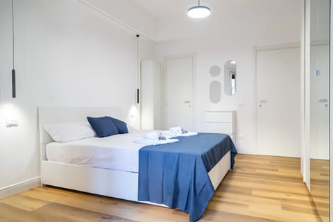 Bed, Photo of the whole room, Bedroom, towels, wardrobe