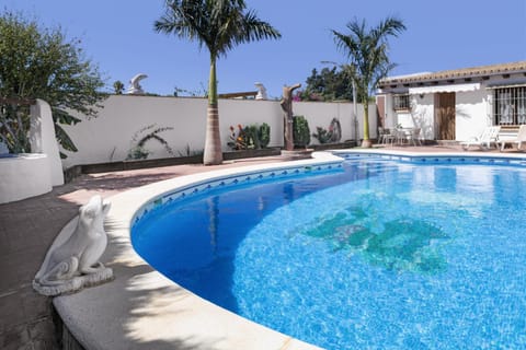 Property building, Living room, Swimming pool