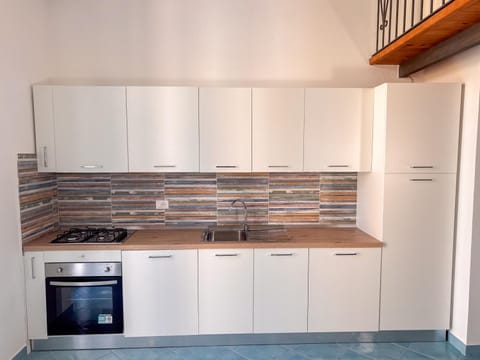 Kitchen or kitchenette, oven