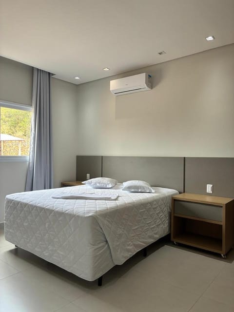 Bed, air conditioner